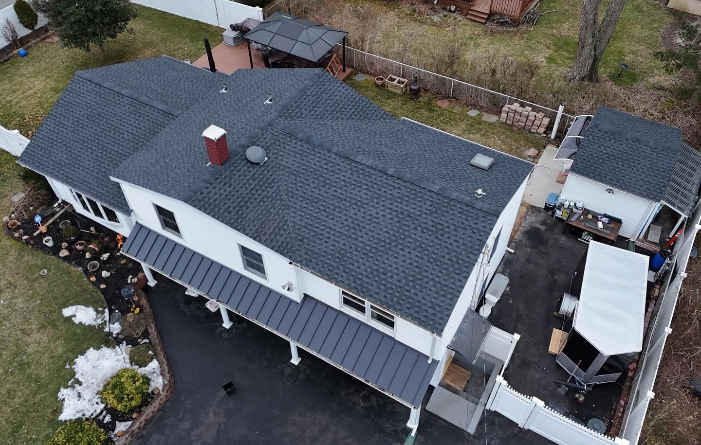 Aerial view of GAF architectural shingles on a residential home